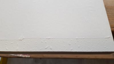 Le papier siliconé est mis en place mouillé