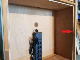 un cadre en bois vient s'insérer dans le compartiment
